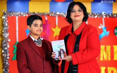 Mrs Sudha Gupta lovingly receives Manikya’s book and gives her blessings